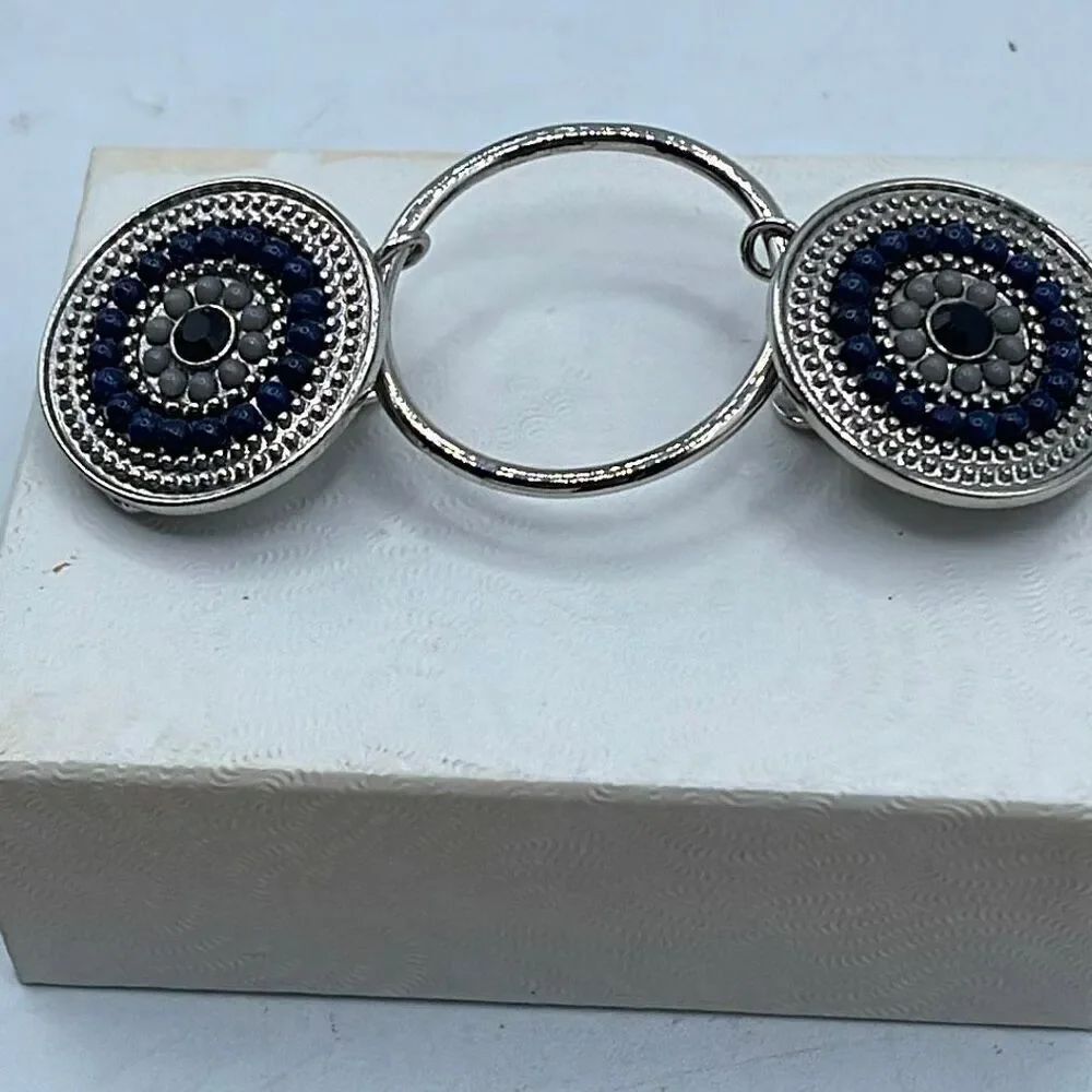 Coco+Carmen Embrace fashion fastener Indigo Sheild design.